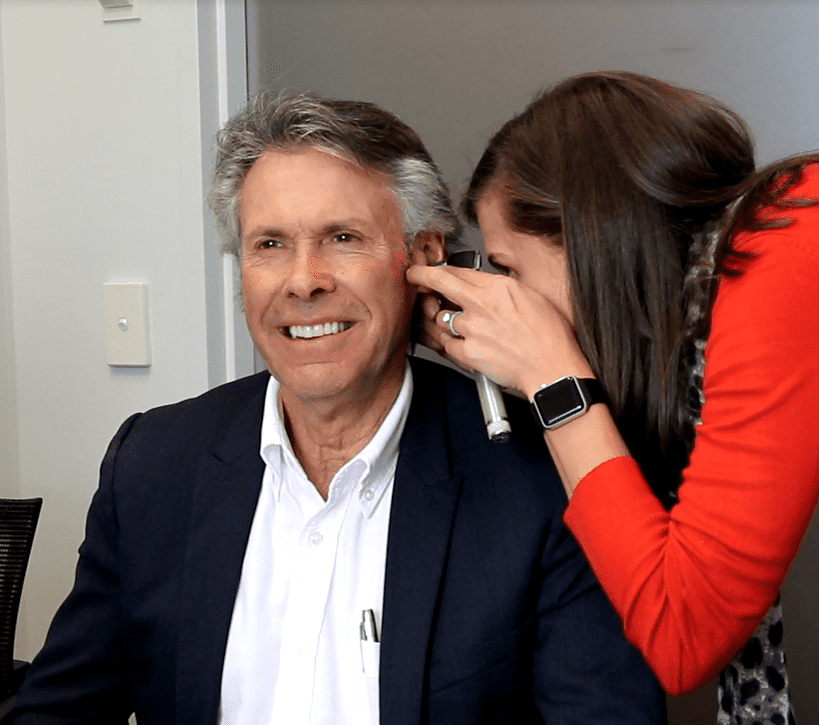 Audiologist Conducting Ear Check