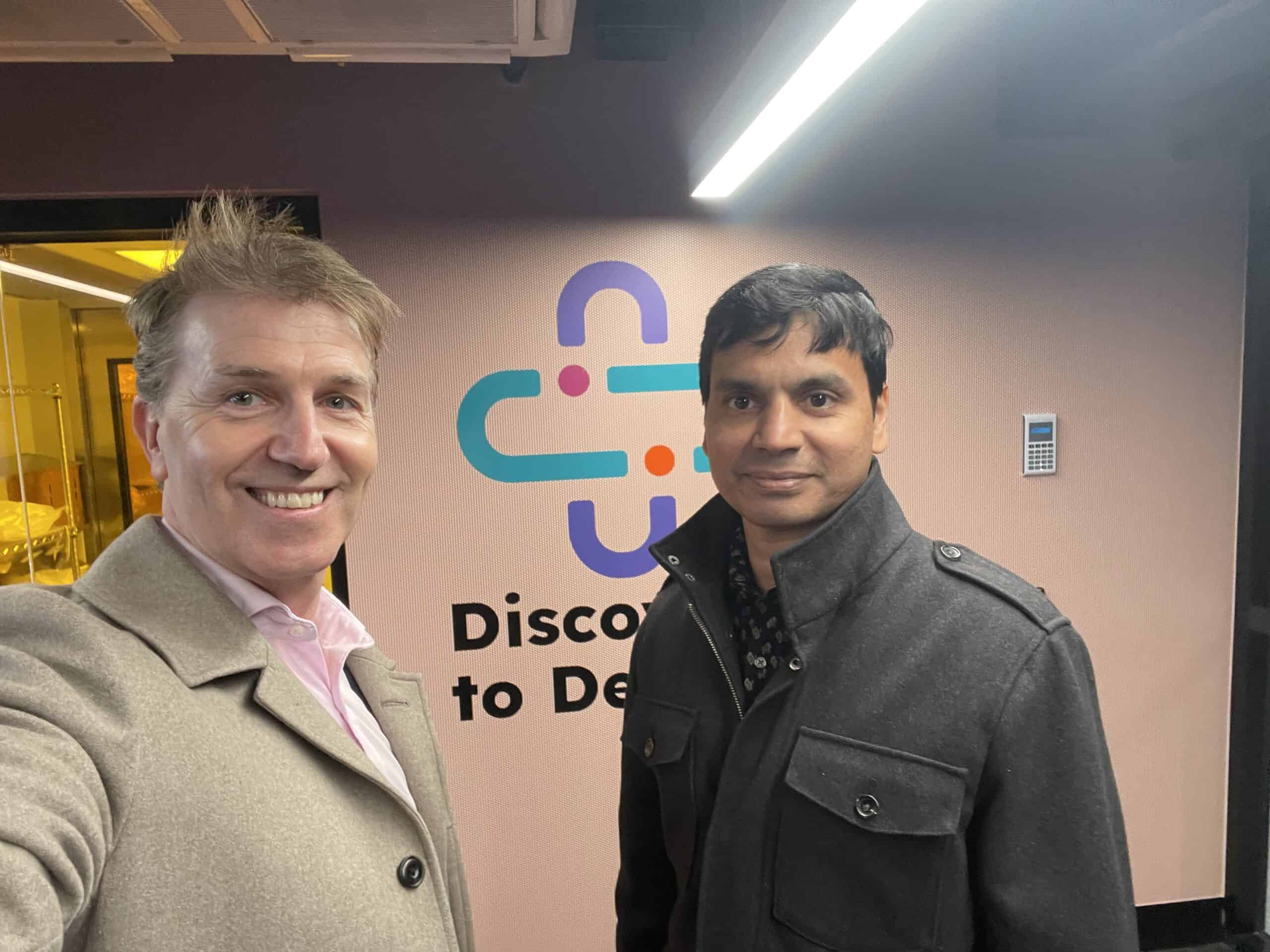 Dr. David Sly and Prof. Sharath Sriram posing for a picture outside the Discovery to Device Facility.