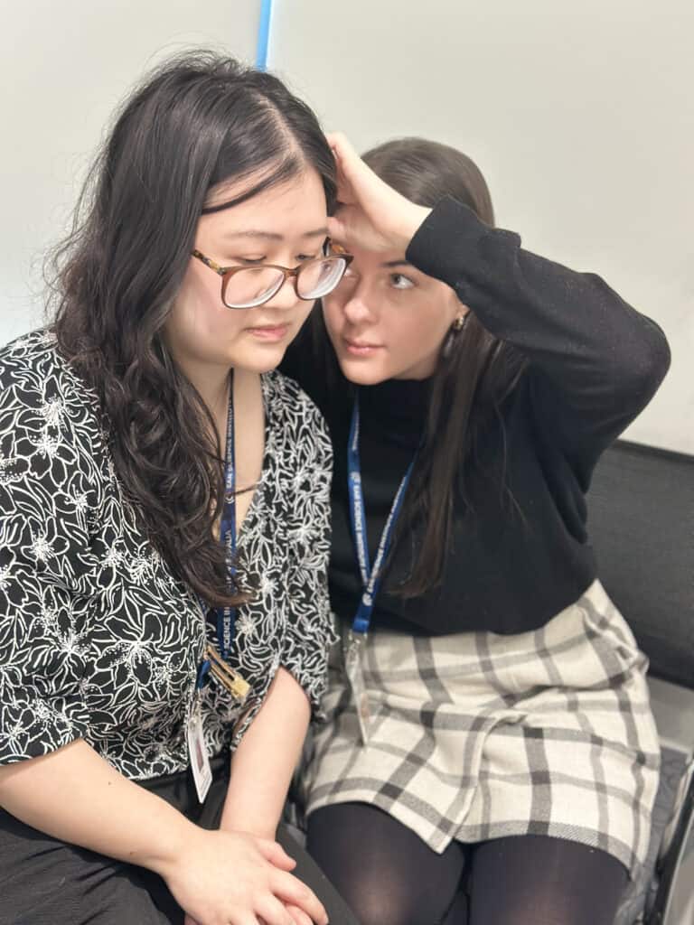 Caroline Fanning using an otoscope on a volunteer during the otoscope training session at Lions Hearing Clinic Nedlands.